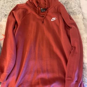 rust color nike sweatshirt